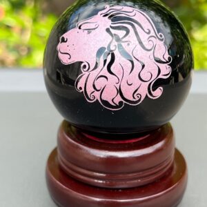 Sfera Ossidiana con  adesivo Leone dm 5,7