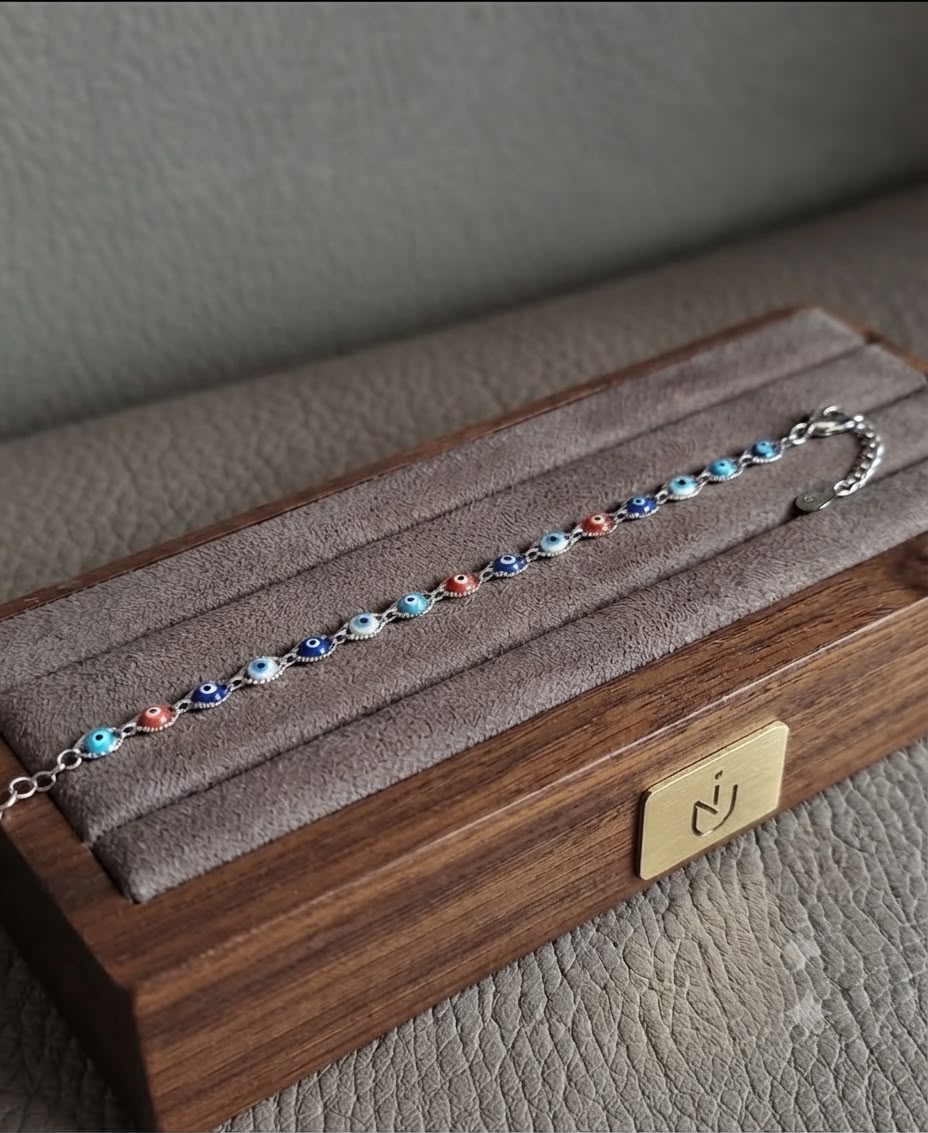 Bracciale in acciaio con occhio turco di vari colori - immagine 3